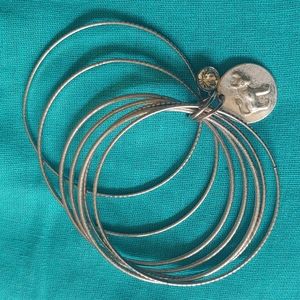 Silver bangles with Taurus bull charm